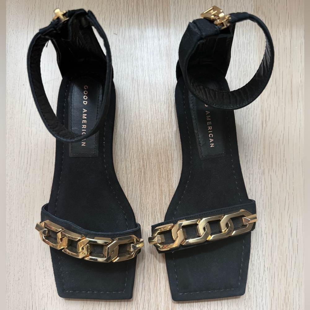 Good American Black Ankle-Strap Heels with Gold Chain Accent